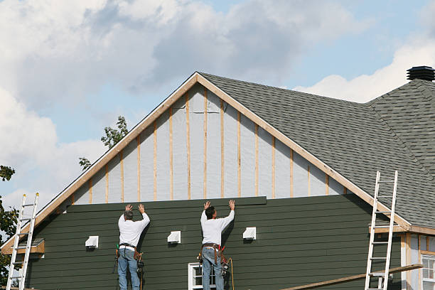 Professional Vinyl Siding technician working in Avon, PA